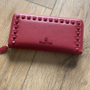 Beautiful, red color woman, brand is Valentino new or without a tag